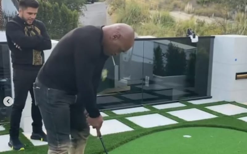 Mike Tyson Spotted Smoking Weed & Golfing At Arnold Schwarzenegger’s Mansion