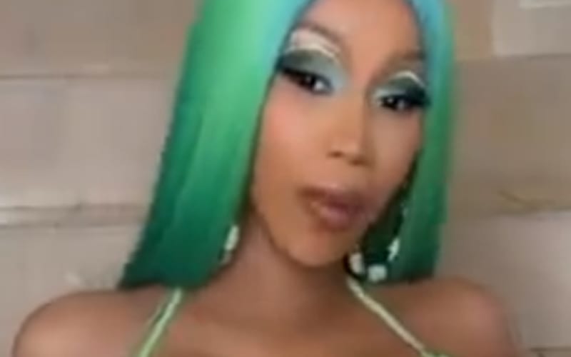 Cardi B Flaunts Baby Bump While Rapping In Multiple Outfits