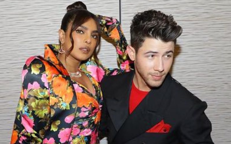 Nick Jonas Helps With Priyanka Chopra’s Outfit On The Red Carpet
