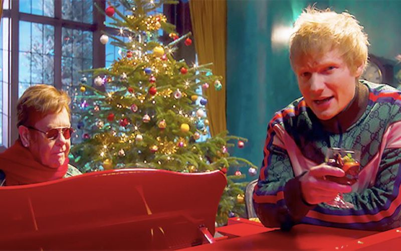 Ed Sheeran & Elton John Rock Matching Sweatsuits In Merry Christmas Video