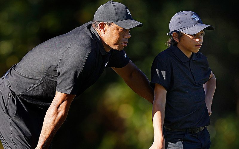 Tiger Woods & Son Charlie Woods Hit The Range Before PNC Championship Pro-Am