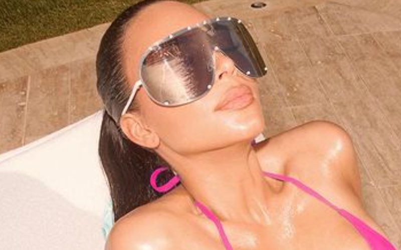 Kim Kardashian Oils Up To Spam Fans With Pink Bikini Photo Drop