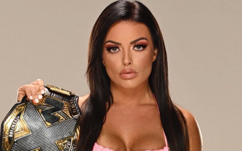 Mandy Rose Drops Smoking Bikini Photo With WWE NXT Women’s Title