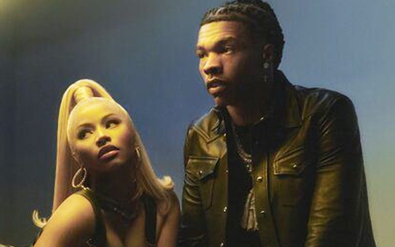 Nicki Minaj Poses Seductively In A Black Dress To Promote New Single With Lil Baby