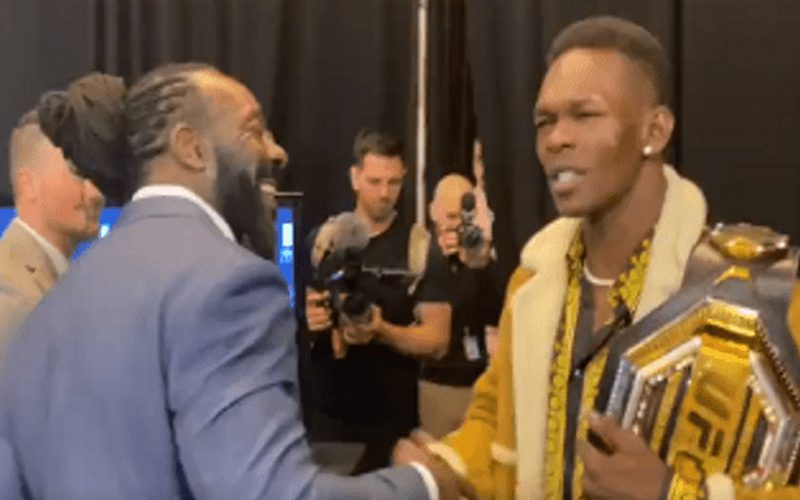 Israel Adesanya Shouts Booker T’s Catchphrase During Post-Fight Press Conference