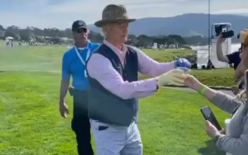 Bill Murray Does Shot With A Fan During Golf Event