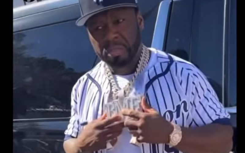 50 Cent Won’t Walk Around Without His Strap While Wearing Massive Chain