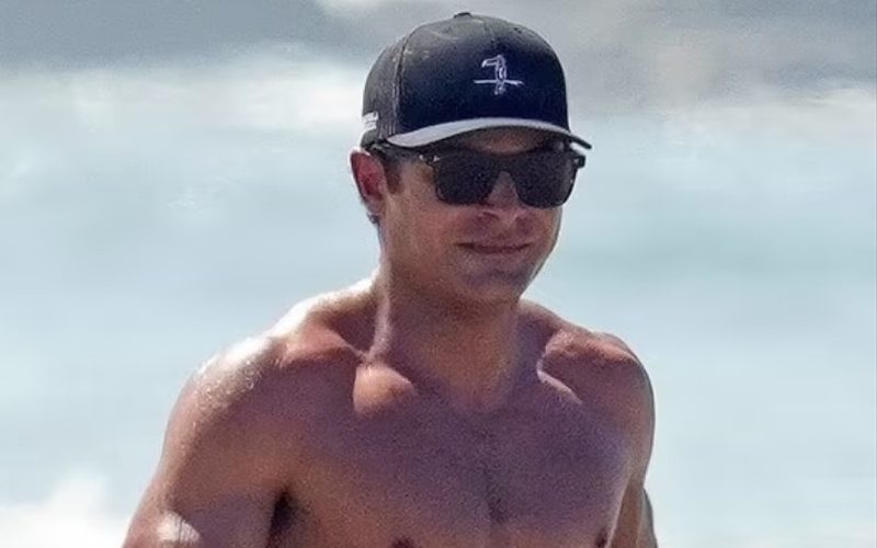 Zac Efron Shows Off Ripped Physique While Vacationing With Mystery Girl