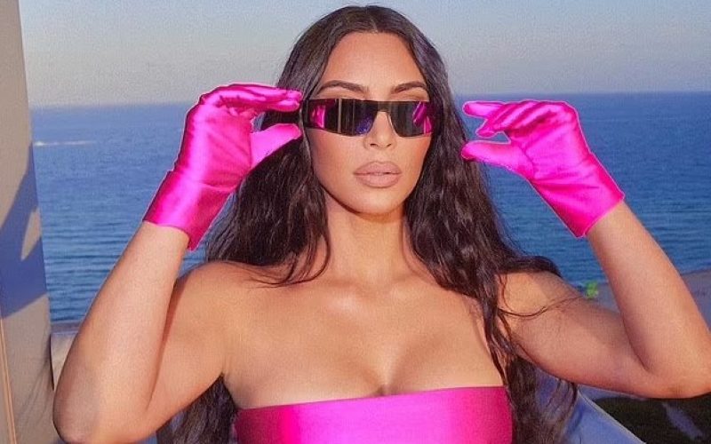 Kim Kardashian Shows Off Her Curves In Hot Pink Bandeau