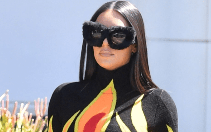 Kim Kardashian Spotted Wearing Flaming Top For Lunch With Khloe Kardashian & Kourtney Kardashian