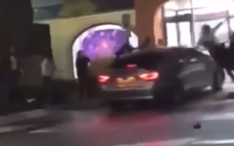 Car Runs Over People & Through A Taco Bell After Heated Argument In Viral Video