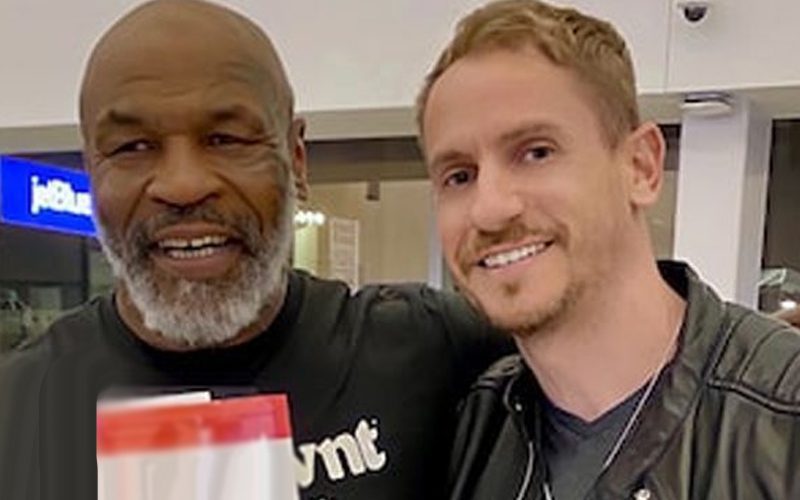 Mike Tyson Snapped Photo With Fan Minutes After Punching Incident On Plane