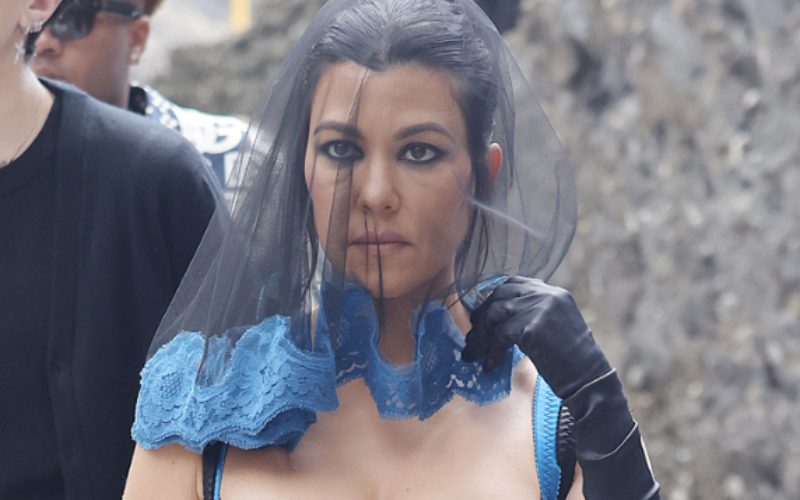 Kourtney Kardashian Rocked A Virgin Mary Emblem & Black Veil For Wedding Weekend