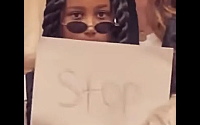 North West Held Up ‘Stop’ Sign At Paris Fashion Week To Get Paparazzi To Leave Her Alone