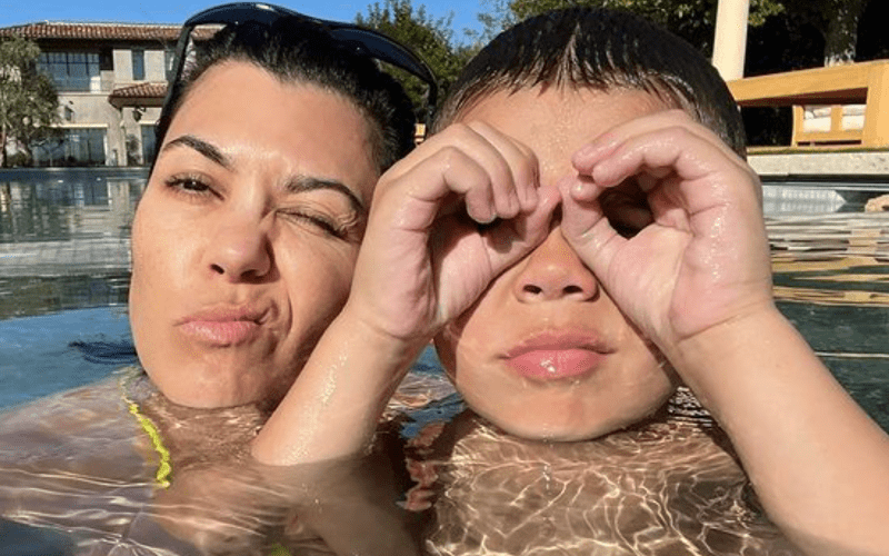 Kourtney Kardashian Rocks Yellow Bikini While Swimming With Her Son Reign