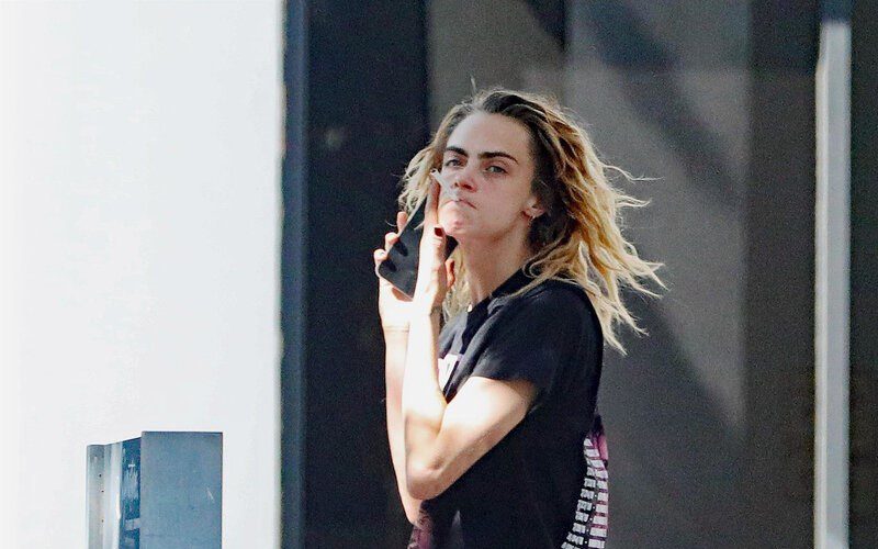 Fans Concerned By Cara Delevigne’s Erratic Behavior At The Airport