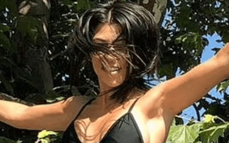 Kourtney Kardashian Shows Off Big In Tiny Black Bikini