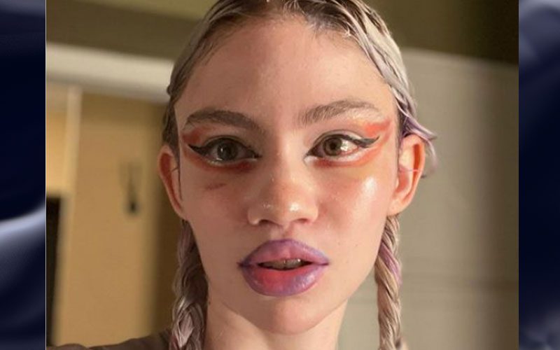Grimes Looks Unrecognizable As She Debuts New Look After Removing Face Bandages