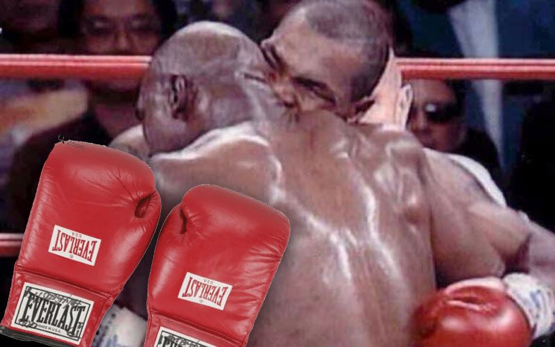 Evander Holyfield’s Gloves From Infamous Mike Tyson Fight Could Sell For $100K