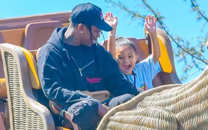 Travis Scott & Stormi Spotted At Theme Park On Father/Daughter Day