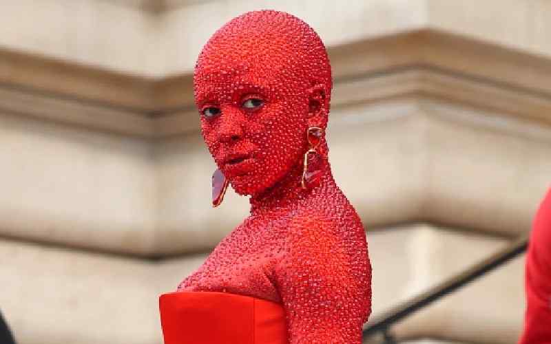 Doja Cat Looks Completely Unrecognizable In Red Crystals At The Schiaparelli Fashion Show