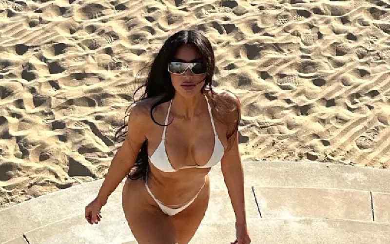 Kim Kardashian Jokes About ‘Long-Handed’ Kendall Jenner’s Recent Photoshop Rumors