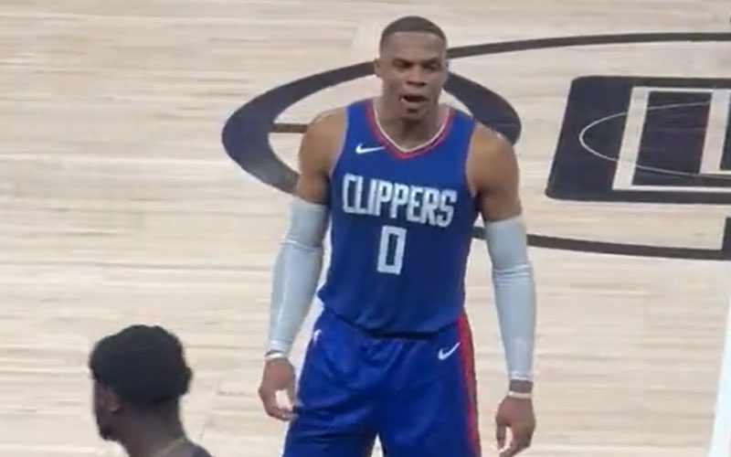 Russell Westbrook Restrained by Teammates in Confrontation with Fans