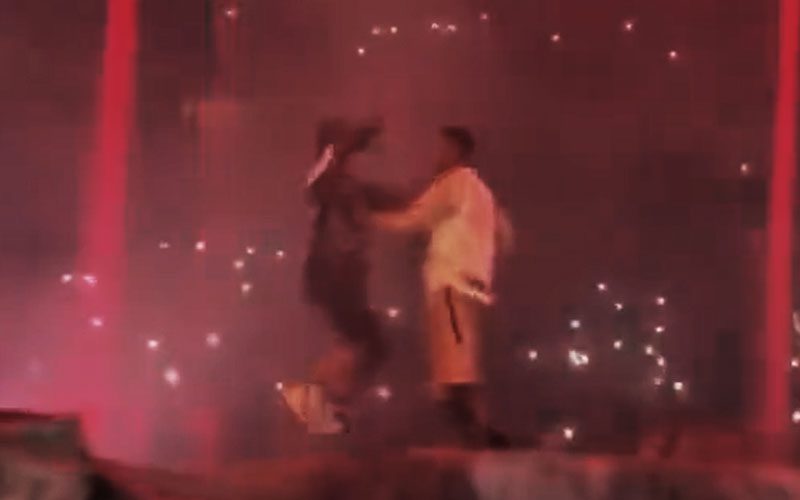 Travis Scott Confronts Fan Who Storms His Stage
